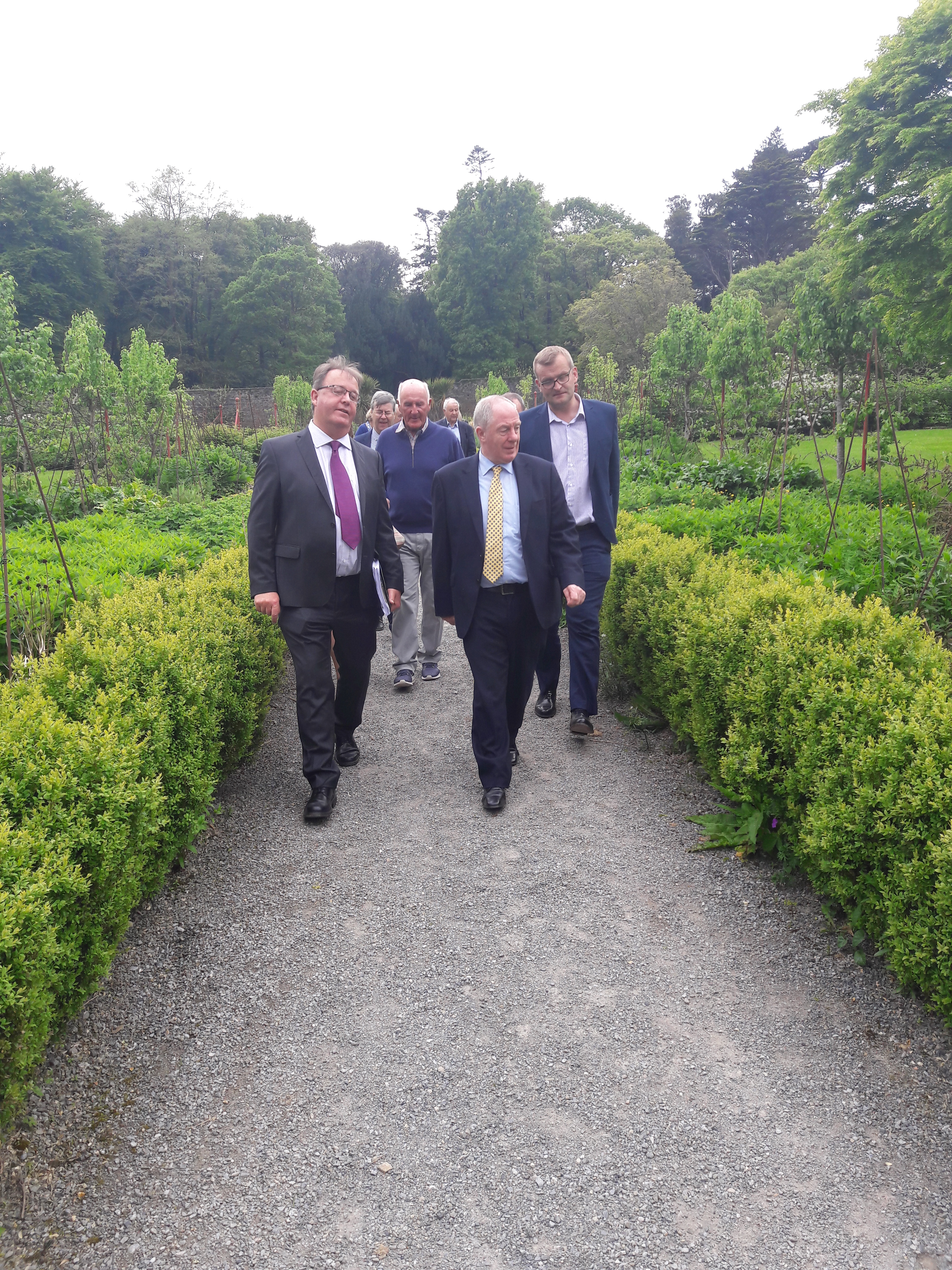 Minister Ring being given a tour of Woodstock Gardens