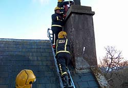 Firemen on the roof of Castle Blunden 2005