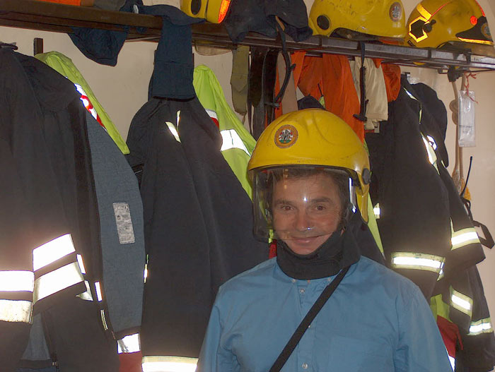French Firefighter tries on Helmet in Kilkenny Fire Station
