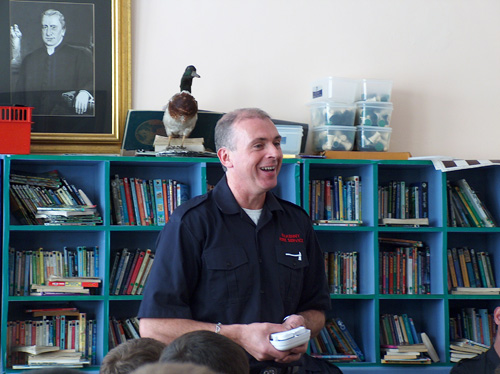 Firefighter Andy Ramsbottom addresses the class