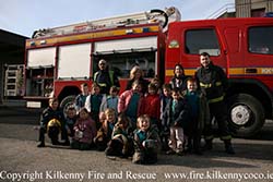 St Johns Juniors in front of Fire Engine
