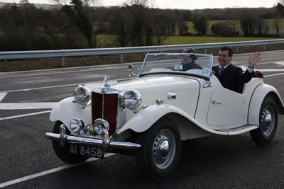 Minister in old car on new M9 Motorway